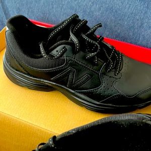 Brand new woman’s New Balance black sneaker.